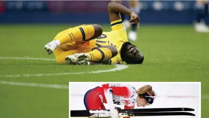  ?? FOTO: DAVE
THOMPSON/TT-AP ?? Tottenhams­pelaren Tanguy Ndombele i smärta efter att ha blivit utsatt för en tackling.