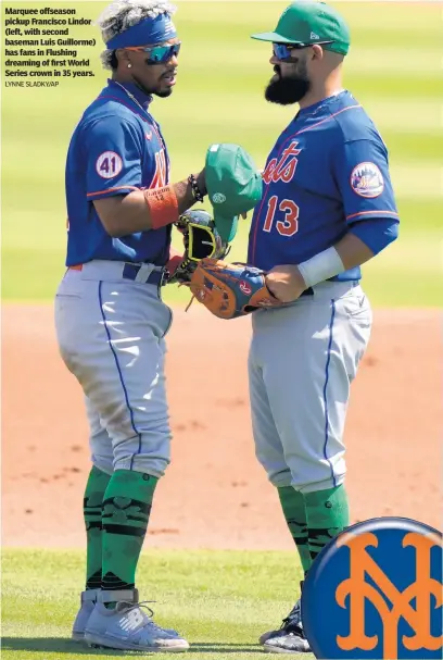  ?? LYNNE SLADKY/AP ?? Marquee offseason pickup Francisco Lindor (left, with second baseman Luis Guillorme) has fans in Flushing dreaming of first World Series crown in 35 years.