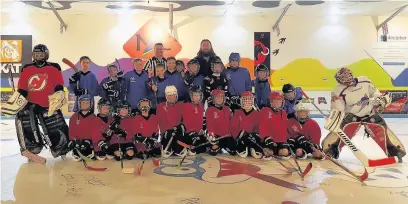  ??  ?? MAC Vipers junior roller hockey team launched at MAC Multi-Activity centre with guest of honour Eric Neilson, a profession­al ice hockey player with Manchester Storm (right)