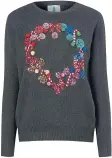  ?? ?? Black light-up sequin wreath Christmas jumper, £20, George.