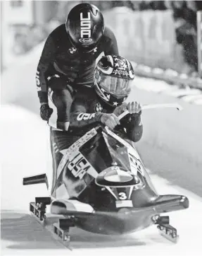  ??  ?? Driver Elana Meyers Taylor, front, and Lolo Jones compete in a women's bobsled World Cup race on Nov. 17 in Park City, Utah. RICK BOWMER/AP
