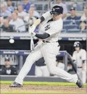  ??  ?? Neil Walker’s three-run home run in the seventh inning was all the offense the Yankees needed to beat the Red Sox on Tuesday in New York.