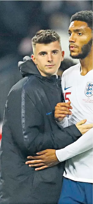  ??  ?? Target: Joe Gomez (right) is consoled by team-mate Mason Mount at full time