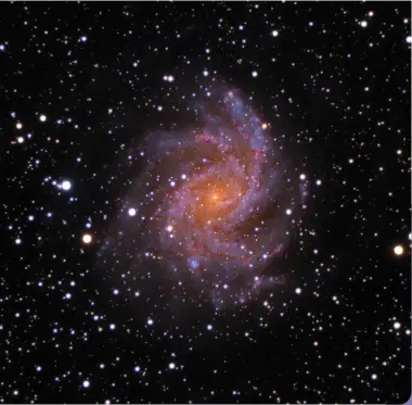  ?? NATHAN DUSO ?? The photograph­er captured this beautiful view of the Fireworks Galaxy using a Celestron 11-inch EdgeHD telescope set up in their backyard in upstate New York on June 18, 2020. Fortunatel­y, even more modest telescopes can reveal many of the subtle features of this striking face-on galaxy.