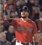  ?? BOB DECHIARA/USA TODAY SPORTS ?? Red Sox DH Kyle Schwarber reacts after his homer in the third inning Tuesday.