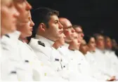  ?? Charles Dharapak / Associated Press 2011 ?? Cadets graduating from the U.S. Coast Guard Academy.