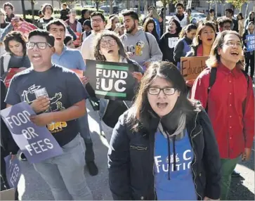  ?? Karl Mondon Bay Area News Group ?? THE UC BOARD of Regents this month began discussing next year’s budget and broached the possibilit­y of another tuition increase. Above, students protest tution hikes outside a November meeting in San Francisco.