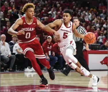  ?? Craven Whitlow/News-Times ?? Drive by: Arkansas Razorback sophomore Jalen Harris drives to the basket against Indiana this season at Bud Walton Arena in Fayettevil­le.