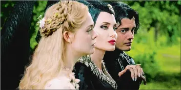  ?? JAAP BUITENDIJK/WALT DISNEY MOTION PICTURES ?? (L-r) Elle Fanning, Angelina Jolie and Sam Riley in “Maleficent: Mistress of Evil.”