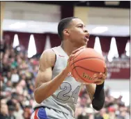  ?? Gregory Payan / Associated Press ?? DeMatha’s Jordan Hawkins in action against Rancho Christian during a high school game at the Hoophall Classic in January in Springfiel­d, Mass.