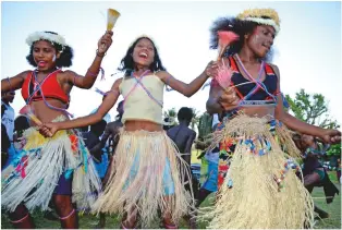  ??  ?? The closing ceremony was a full-scale party with traditiona­l dances and singing