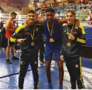  ??  ?? MEDALLISTS: Brady Cronin, Joshua Sholoye and Georgie Ellis [from left to right] get results in Sweden