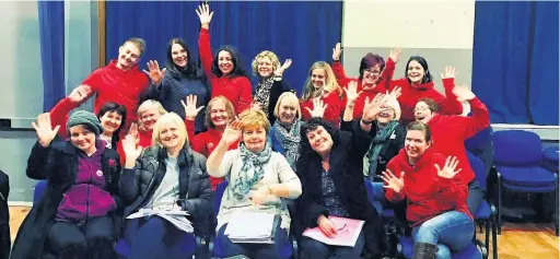  ??  ?? Members of Voice to Voice choir celebrate after being invited to New York to perform