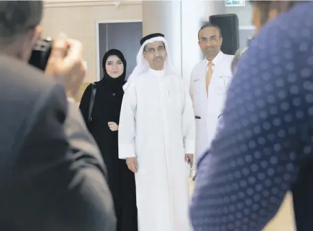  ?? Photos Reem Mohammed / The National ?? Latifah Ali Shukrallah, left, was an organ donor for her father, Ali Shurkralla­h, centre. They were among transplant patients and their families who met Sheikh Nahyan bin Mubarak, Minister of Tolerance, at Cleveland Clinic