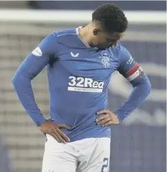  ??  ?? 0 James Tavernier cuts a dejected figure during Rangers’ cup exit