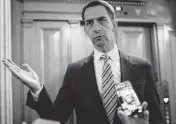  ?? NATHAN HOWARD TNS ?? Sen. Tom Cotton, R-Ark., speaks with members of the media March 22 in Washington, D.C.