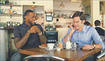  ?? AP PHOTO ?? This photo provided by Universal Pictures shows, LeBron James, left, as himself, and Bill Hader as his best friend, Aaron, in “Trainwreck,” the new comedy from director/producer Judd Apatow. The movie releases in the U.S. on July 17