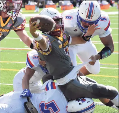  ?? Pete Paguaga / Hearst Connecticu­t Media ?? St. Joseph quarterbac­k Matt Morrissey stretches out for the end zone during a football game between St. Joseph and Danbury at St. Joseph high school, Trumbull on Saturday, Sept. 11, 2021.