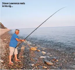  ??  ?? Steve Lawrence reels in his rig...