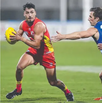  ?? Picture: GETTY IMAGES ?? ON COURSE: Izak Rankine of the Suns is tracking well to make his much-anticipate­d AFL debut when the competitio­n resumes in July.