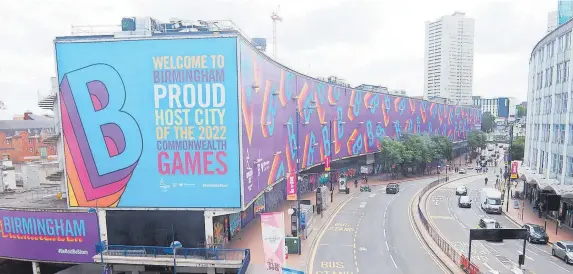  ?? ?? The Ringway Centre on Smallbrook Queensway has been covered up with a huge Birmingham 2022 Commonweal­th Games branding banner