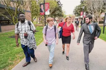  ?? Photos by Melissa Phillip/Staff photograph­er ?? Tera Torres, center, director of the University of St. Thomas’ two-year Pragmatic Studies program, said her students aren’t limited, but “the systems haven’t met them where they’re at.”