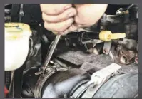  ??  ?? With the downpipe installed, we turned our attention toward ensuring the other two V-band clamps were tight. The last clamp to be fully tightened up was the unit located on the back of the turbocharg­er. After that, all fittings were checked.