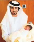  ??  ?? Baby Zayed Mohammad Al Mansouri with his uncle.