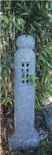  ??  ?? A granite Japanese gatepost, from Capital Iron, nestles in a clump of bamboo.