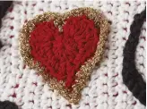  ??  ?? Make this shimmering heart with a Gold Creative Lamé border to take centre stage.
