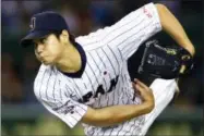  ?? SHIZUO KAMBAYASHI - THE ASSOCIATED PRESS ?? FILE - In this Nov. 19, 2015, file photo, Japan’s starter Shohei Otani pitches against South Korea during the first inning of their semifinal game at the Premier12 world baseball tournament at Tokyo Dome in Tokyo.