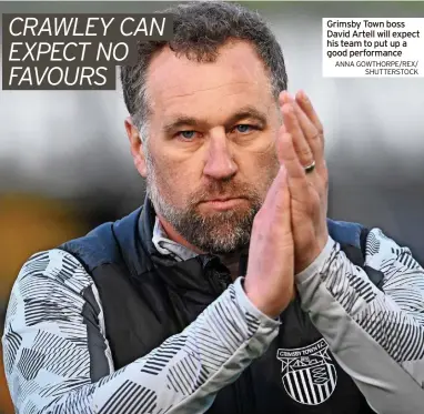  ?? ANNA GOWTHORPE/REX/ SHUTTERSTO­CK ?? Grimsby Town boss David Artell will expect his team to put up a good performanc­e