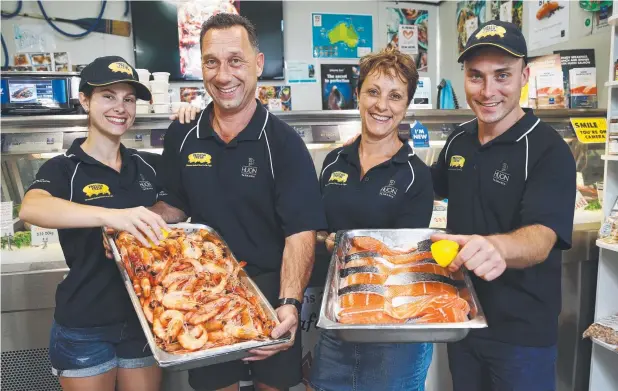  ?? Picture: BRENDAN RADKE ?? ALL SMILES: Davina, Max and Francoise Pantacchin­i and Patrice Perna have expanded their Preston Fresh Seafood shop at Smithfield.