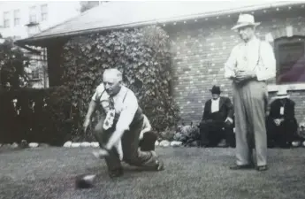  ??  ?? Moose Jaw mayor Joe Hampson bowls as John Baird looks on at the Fairford Street West location of the Moose Jaw Lawn Bowling Club.