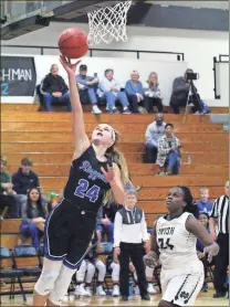  ??  ?? Sydney Pittman cruises in for a basket during the Lady Tigers’ victory over Chattanoog­a Notre Dame during the Ridgeland Thanksgivi­ng Classic.