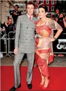  ??  ?? THE MODFATHER ANDTHE PATRIOT: Bradley Wiggins’s wife Catherine wore a Vivienne Westwood Union Jack dress