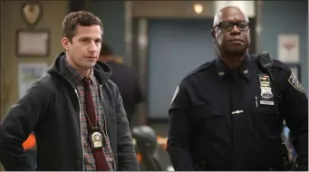  ?? JORDIN ALTHAUS — NBC/TNS ?? Andy Samberg, left, and Andre Braugher in a scene from “Brooklyn Nine-Nine.”