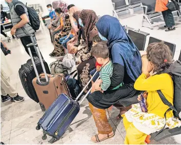  ?? ?? New arrivals Around 60 refugees from Afghanista­n will be offered a home in West Lothian