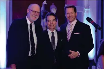  ??  ?? Vincenti with John Ellery - FEPE MD and François de Gaspé Beaubien - Chairman & CEO of Zoom Media receiving the FEPE Internatio­nal Leadership Award 2015.