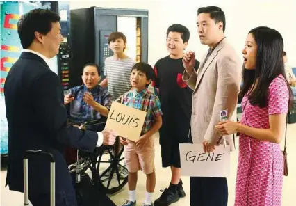  ?? Michael Ansell / ABC via AP ?? Ken Jeong, from left, Lucille Soong, Forrest Wheeler, Ian Chen, Hudson Yang, Randall Park and Constance Wu appear in a scene from the season finale of “Fresh Off The Boat.”