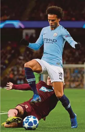  ?? AFP PIC ?? Manchester City’s Leroy Sane is tackled by Hoffenheim’s Pavel Kaderabek in a Champions League Group F match at the Etihad Stadium on Wednesday.