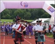  ?? MARIAN DENNIS — MEDIANEWS GROUP ?? Relay for Life of Pottstown kicked off with a survivor and caregiver lap around the track.