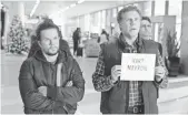  ??  ?? Dusty (Wahlberg) and Brad (Ferrell) wait at the airport for their fathers.