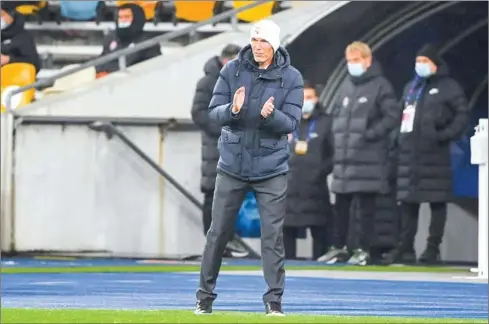  ?? AFP ?? Real Madrid’s French coach Zinedine Zidane reacts during the Uefa Champions League Group B football match between Shakhtar Donetsk and Real Madrid at the Olimpiyski­y stadium in Kiev on December 1. Real was defeated 2-0.