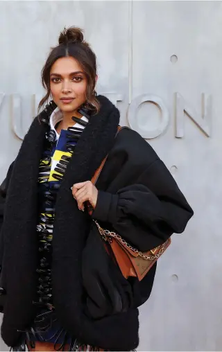  ?? WireImage; Louis Vuitton ?? Above, Deepika Padukone at Louis Vuitton’s Cruise show in California; left, in the brand’s latest campaign for Dauphine leather goods