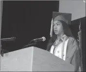  ??  ?? Eden Lakner gives her valedictor­y speech during St. Charles High School graduation ceremonies Thursday night.