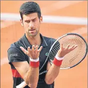  ?? AFP ?? After Tuesday’s loss to Marco Cecchinato, Novak Djokovic could skip the upcoming grasscourt season.