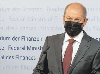  ?? FOTO: WOLFGANG KUMM/DPA ?? Will Unternehme­n und Bürgern helfen; das Geld wird aber nicht so stark abgerufen wie geplant: Bundesfina­nzminister Olaf Scholz (SPD).