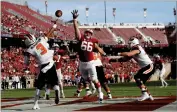  ?? AP FILE PHOTO BY MARCIO JOSE SANCHEZ ?? In this 2016 photo, Oregon State quarterbac­k Marcus Mcmaryion (3) throws from the end zone under pressure from Stanford defensive tackle Harrison Phillips (66) during the second half of an NCAA college football game in Stanford.