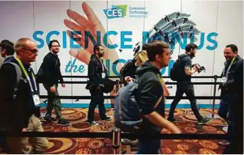  ?? Bloomberg ?? Big anticipati­on Attendees arrive for CES Unveiled at the 2016 Consumer Electronic­s Show in Las Vegas. CES is expected to bring a range of announceme­nts in virtual reality, self-driving cars and drones.